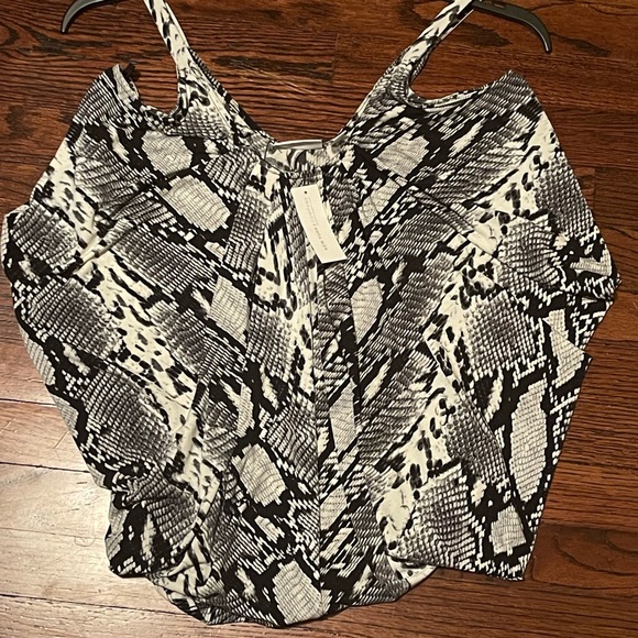 New York & Company Tops - NWT. New York and company snake skin print top. Size Med. Cold shoulder